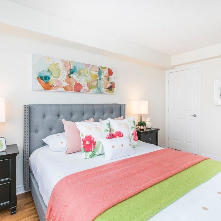 Bright bedroom with modern décor in an independent living apartment at Villagia in the Glebe, Ottawa