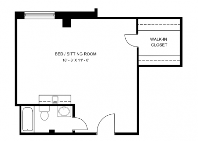 A cozy studio suite in our Orangeville retirement community, featuring a bright bed/sitting area, private bathroom with full tub, and spacious walk-in closet—designed for comfort and peace of mind.